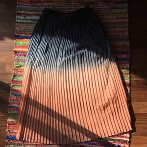 Accordion pleat complementing color ombré